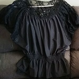 Beautiful black top, with beads and stones on it.